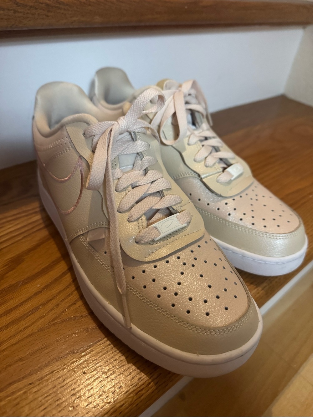 Nike Women's Low-Top Sneakers in Cream with Pink Accent
